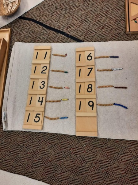 Some beads, showcasng the numbers 11-19.